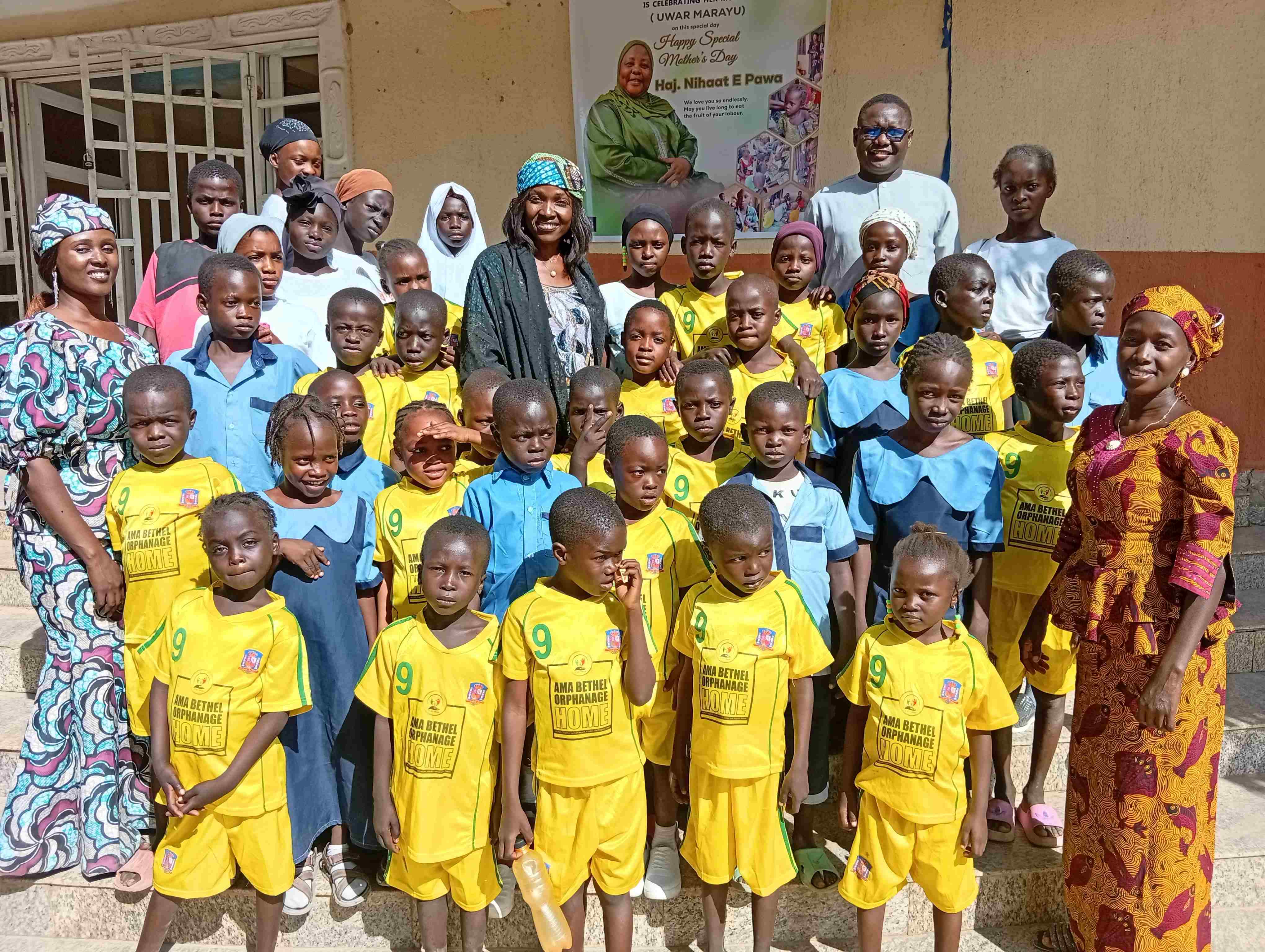 Children dressed in uniform at a donor appreciation programme