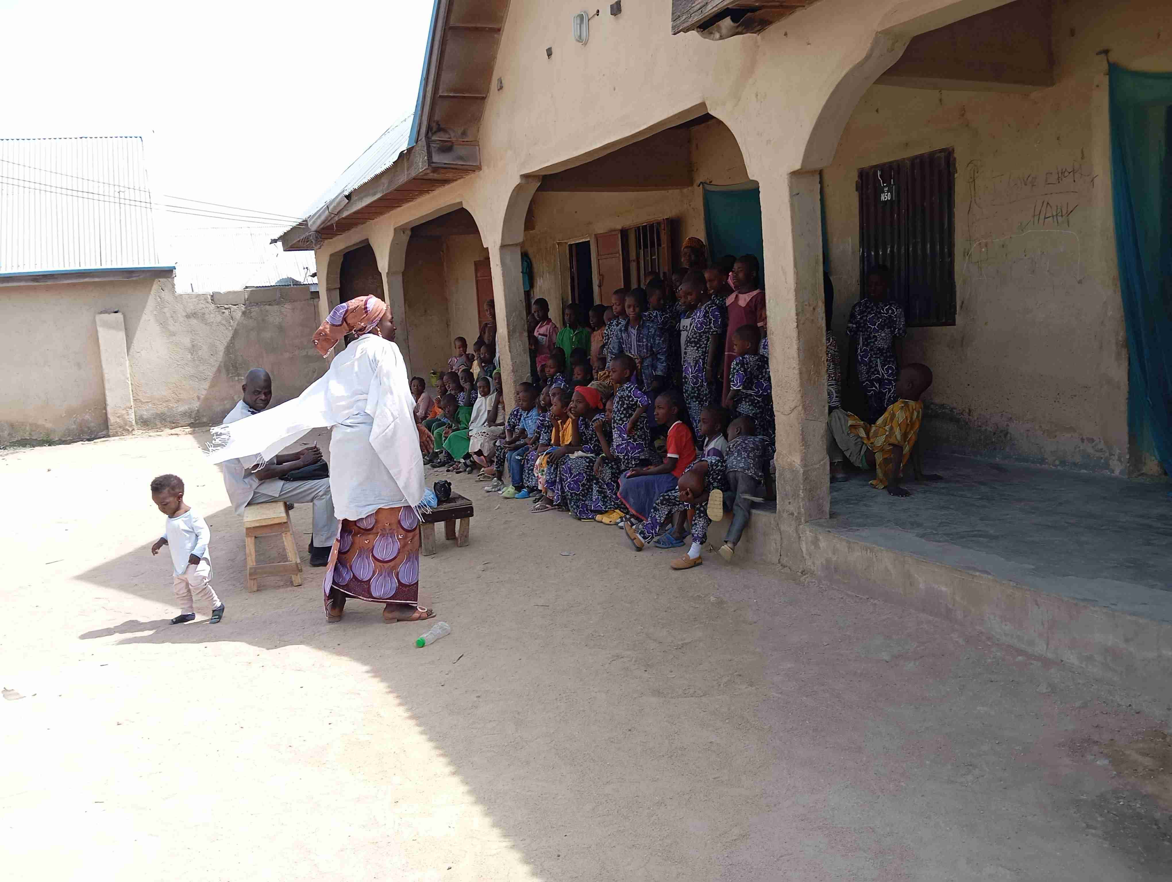 Children listening attentively during an address