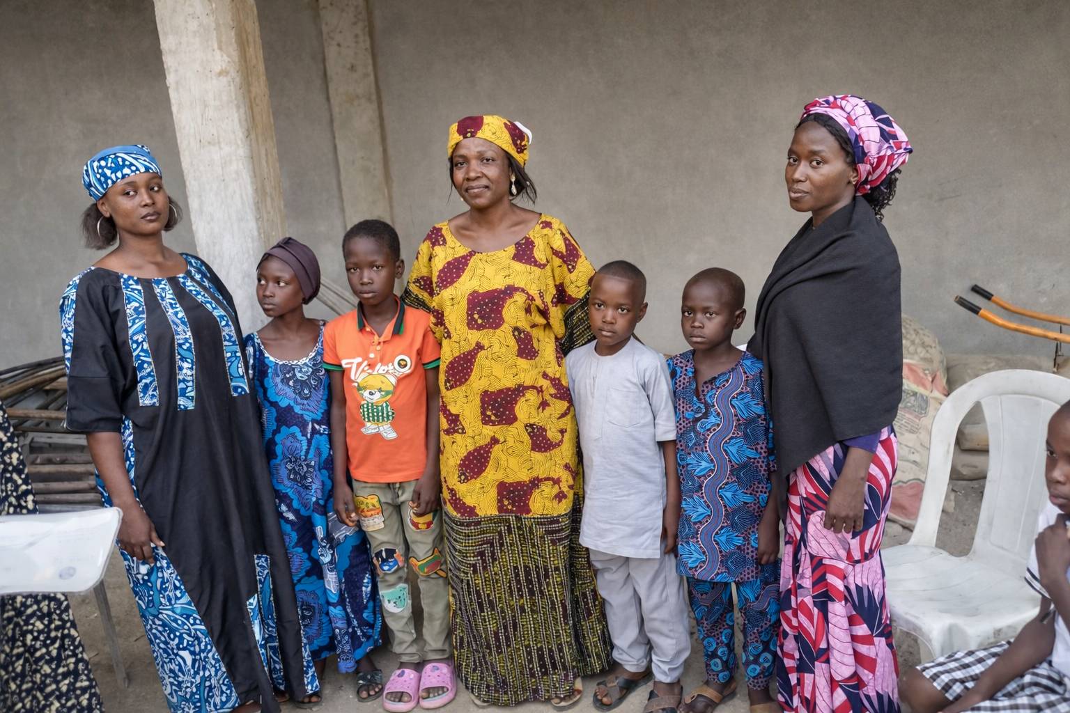 Children with the founder and their teachers